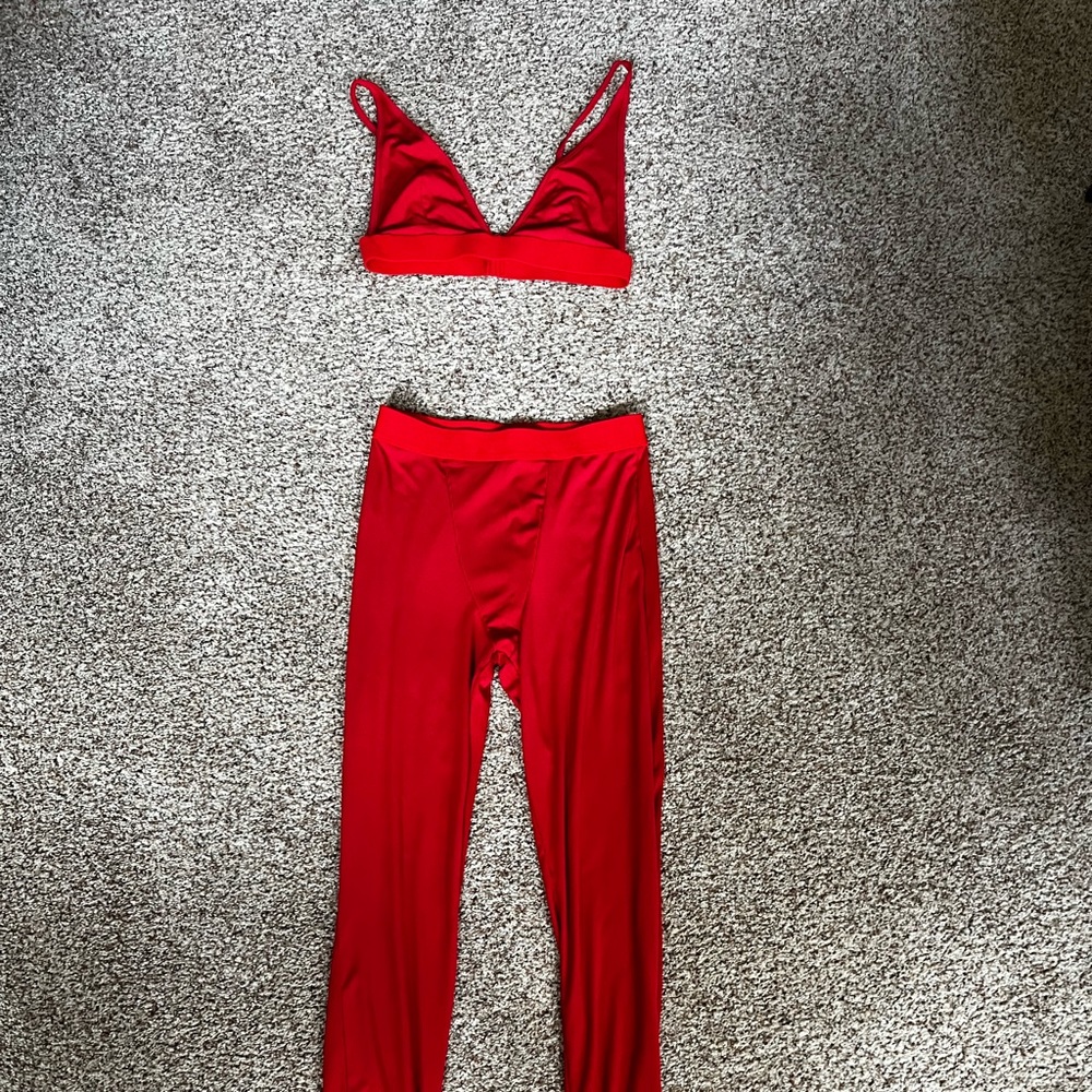 Red two piece bralette and leggings set.